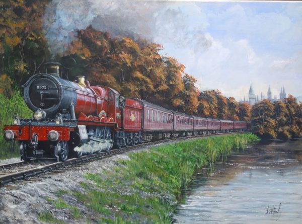 ' Olton Hall'. GWR Hall class locomotive number 5972 in her modern red livery pulls an express service through the Highlands.